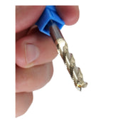 Someone holding the golden boy bit against a white background 
Upcut CNC bits
High-speed CNC bits
CNC bits for roughing
Durable CNC materials
Solid carbide CNC bits
1/4 inch CNC bits
Premium CNC wood bits
CNC bits for hardwood
Precision CNC bits
CNC bits with high feed rates
Best CNC bits
Long-lasting CNC bit
Carbide-tipped CNC bits
Industrial CNC bits
Affordable CNC materials