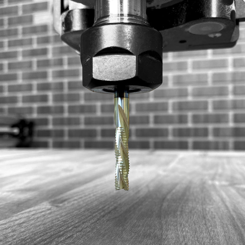 Golden girl bit in the Cnc with a board underneath 