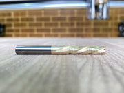 Golden girl bit laying on a wooden panel 