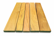 Five wooden planks with a natural finish on a white background